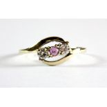 A 9ct yellow gold stone set ring, (P).