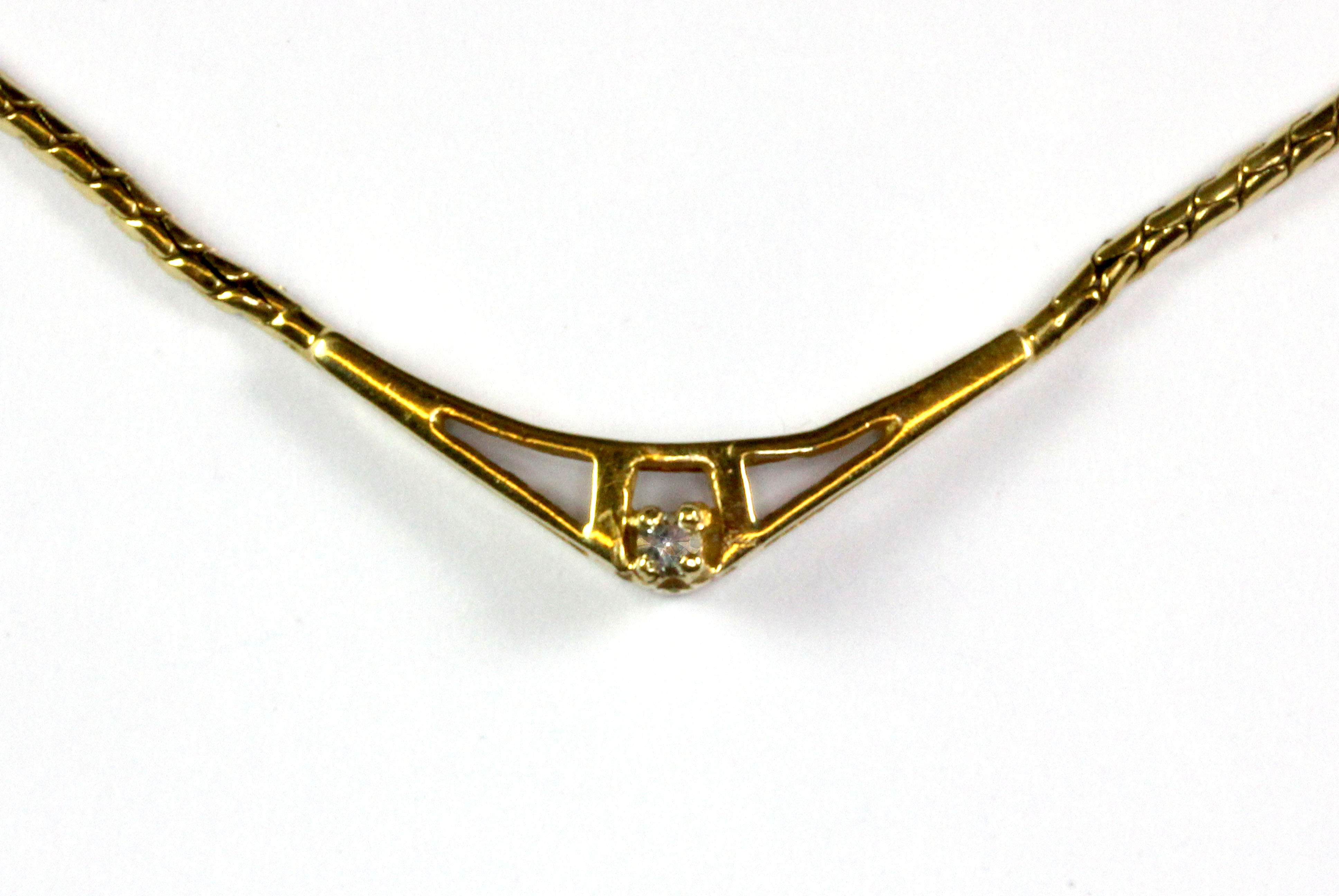 A 9ct yellow gold diamond set necklace together with a 9ct gold cross pendant, approx. 6.2g.