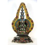 A Tibetan cold painted silvered bronze figure of a multi-headed Avalokitesvara deity, H. 29cm.