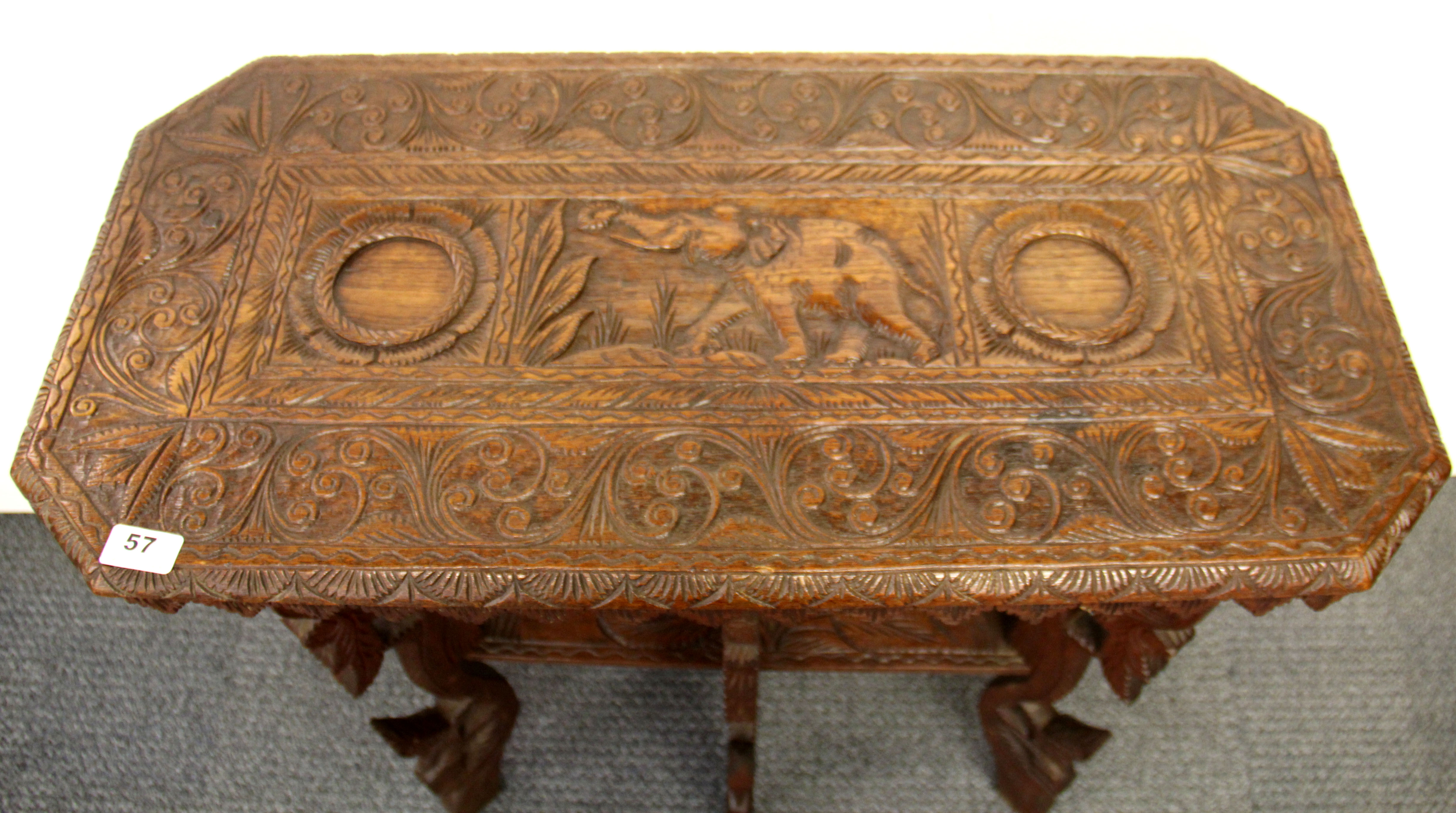 A Burmese carved hardwood table, 77 x 38 x 66cm. - Image 2 of 3