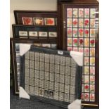 A quantity of framed cigarette cards.