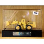 A presentation die cast model bulldozer.