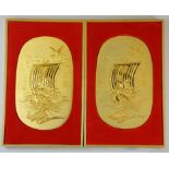 A pair of Chinese 24ct gold plated metal panels housed in wooden cases, panel H. 16cm.