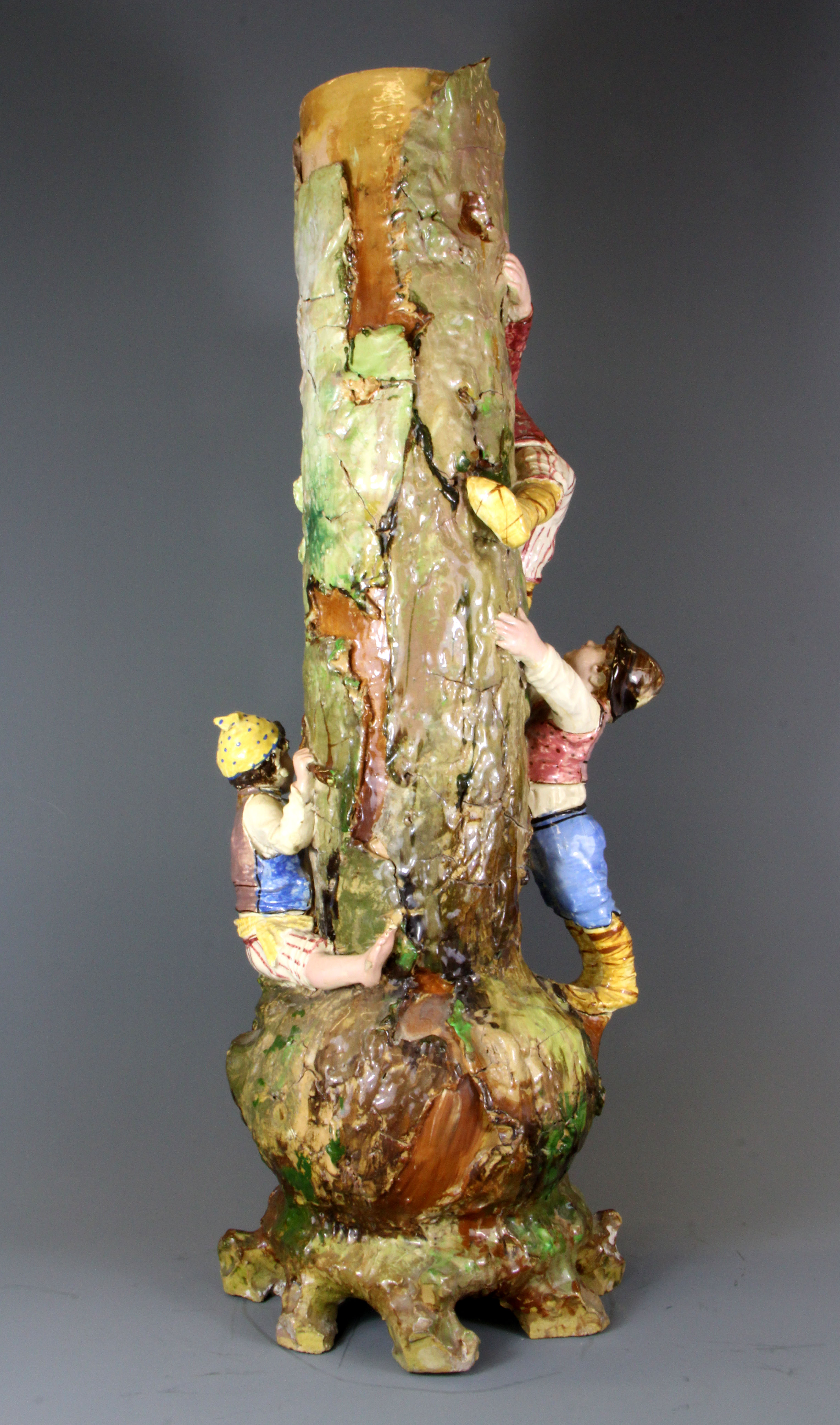 A large early 20th Century hand made pottery vase of children climbing a tree, H. 60cm. - Image 2 of 2