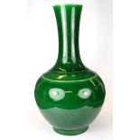 A Chinese green glazed porcelain vase, H. 43cm, with six character mark to base.