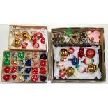 A quantity of vintage Christmas decorations.