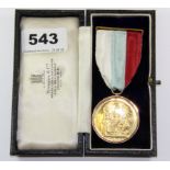 A cased Masonic 9ct gold mounted medal.