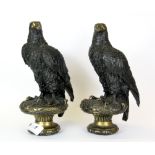 A pair of bronze eagle figures, H. 23cm.