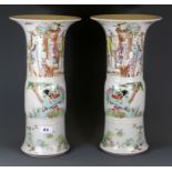 A pair of Republican period Chinese hand painted porcelain vases with flared necks, H. 43cm.