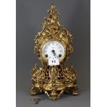 A gilt brass mantle clock, H. 34cm.