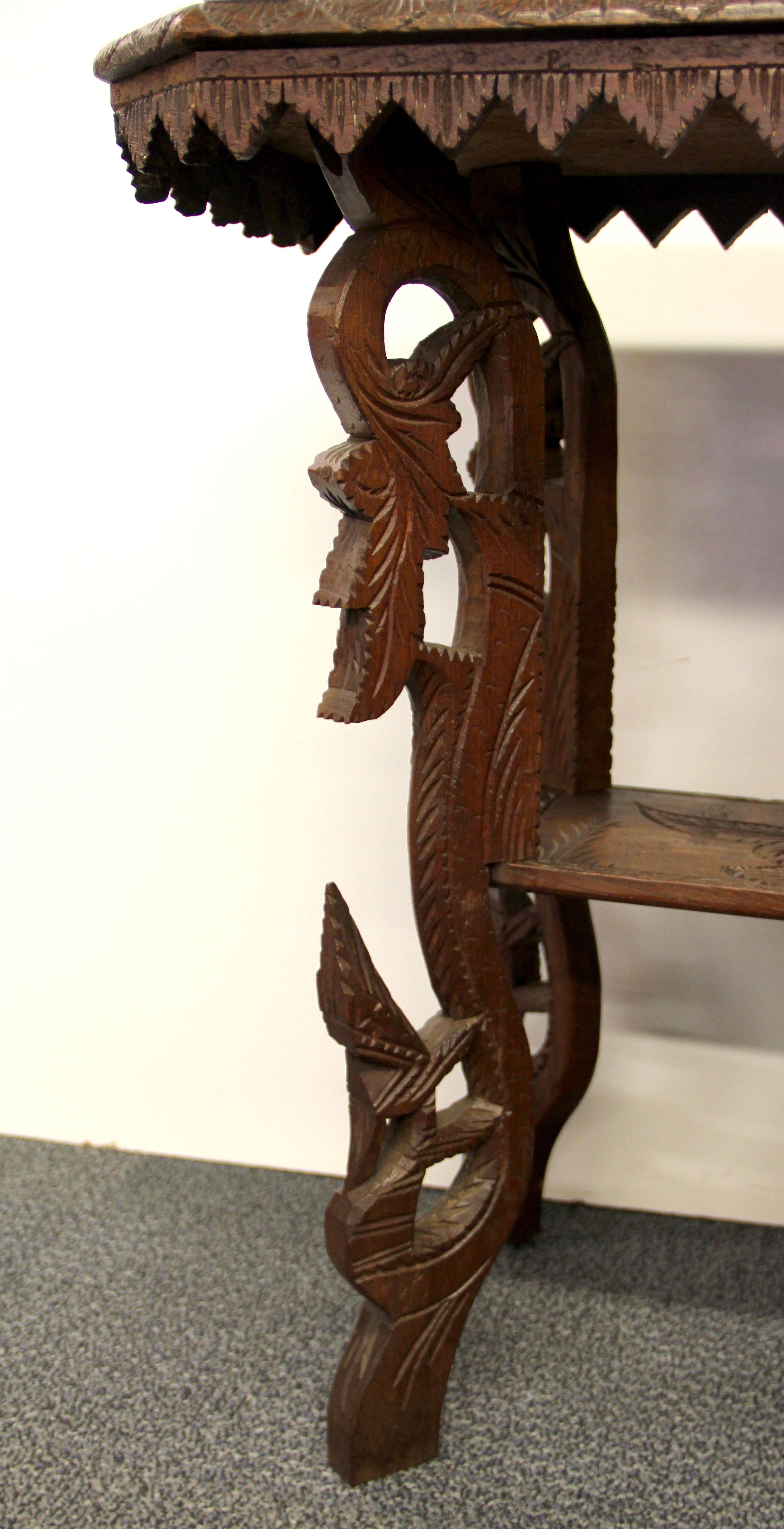 A Burmese carved hardwood table, 77 x 38 x 66cm. - Image 3 of 3