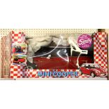 A boxed Sindy Mini Cooper car.