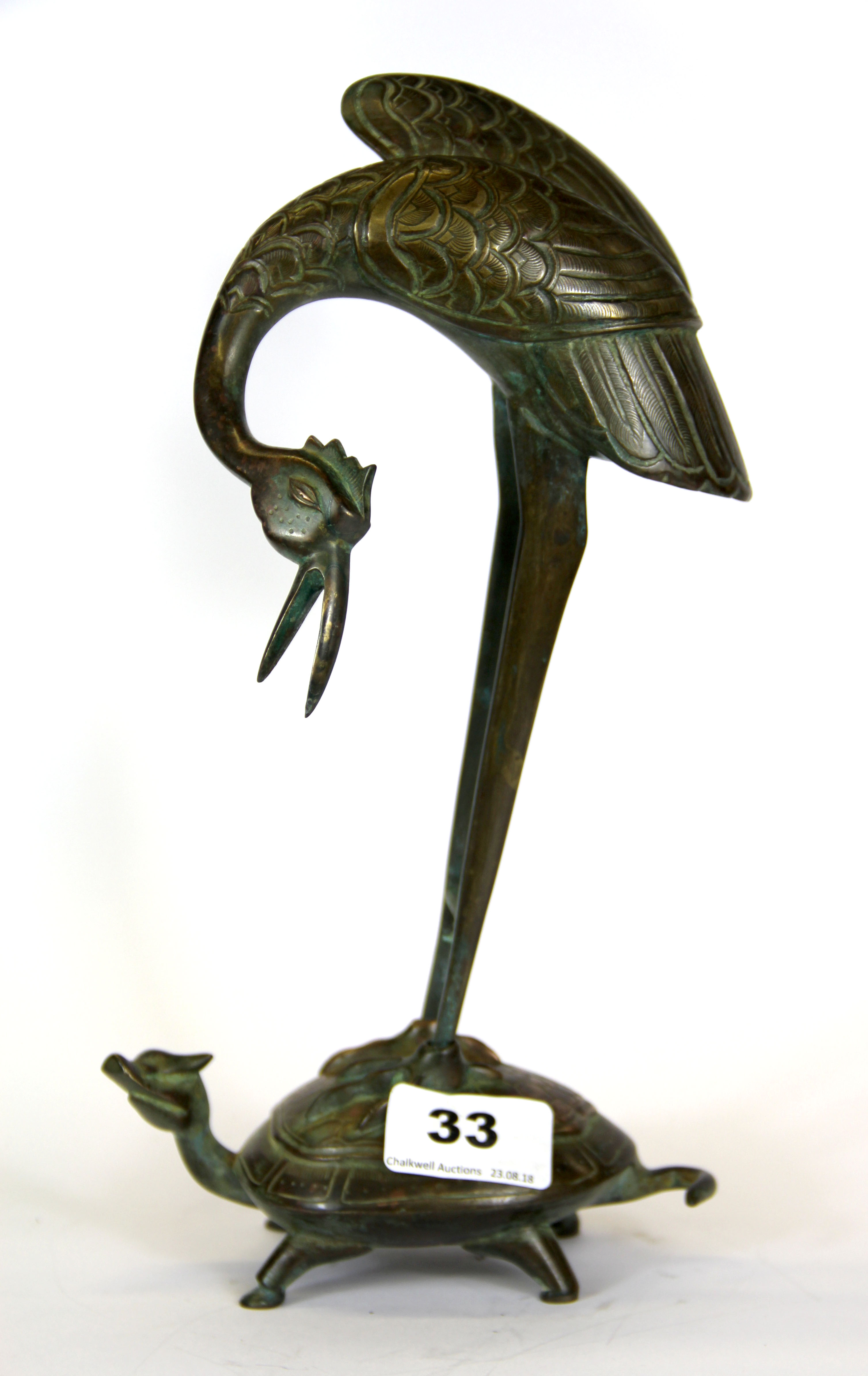 An early 20th Century Chinese bronze figure of a crane riding on the back of a mythical tortoise, H.