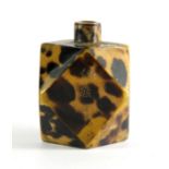A small multi-facetted tortoise shell veneered snuff bottle with extensive gilt calligraphy, H. 5cm.