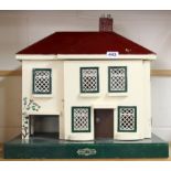 An Amersham Toys wooden dolls house and furniture contents, H. 49cm.