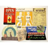 A collection of card mounted advertising items.