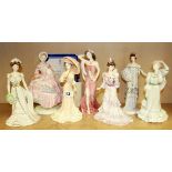 Seven Royal Worcester and Coalport porcelain figurines.