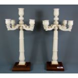 A pair of early 20th Century ivory candelabra, c. 1910, H. 39cm.