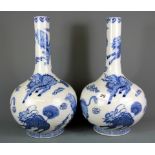 A pair of Chinese blue and white porcelain vases with four character mark to base, H. 38cm.