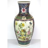 A mid 20th Century Chinese and enamelled porcelain vase, H. 43cm.