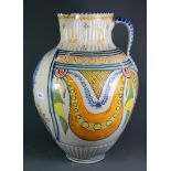 A large 19th Century Spanish hand painted pottery jug, H. 50cm, (repaired).