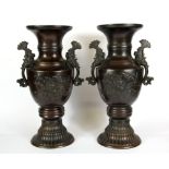 A pair of 19th Century Japanese bronze vases, H. 31cm.