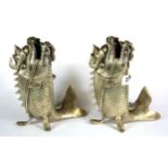 A pair of interesting Chinese silvered metal lion fish censers, H. 21cm.