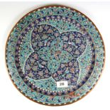 Islamic interest, a Persian enamelled copper tray, Dia. 36cm.