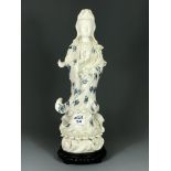 A superb Chinese blue decorated handmade Blanc de Chine porcelain figure of the goddess Guanyin