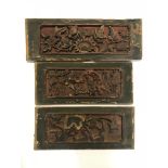 Three 19th Century Chinese carved wooden panels, 32 x 14cm.