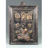 A Siamese "fragrant ash" Buddhist pilgrims panel of a monk seated underneath images of the Buddha,