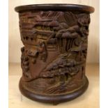 A Chinese finely carved bamboo brush pot. H.16cms