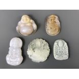 A group of five small carved jade and agate deity amulets, H. 5.5cm.