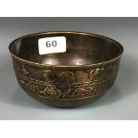 A 19th Century Tibetan bronze singing bowl, Dia. 12.5cm, D. 6cm.