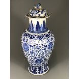 A 19th Century Chinese hand painted porcelain vase and cover, H. 49cm, (repair to rim).