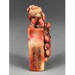 A mid-20th Century Chinese carved soapstone seal, H. 8cm.