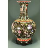 A superb large Chinese hand enamelled porcelain vase with carved hardwood base, vase H. 57cm, base