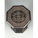 A Chinese carved dark hardwood octagonal box and cover, H. 13cm.