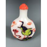A Chinese four colour Peking carved cameo glass snuff bottle, H. 6.5cm.