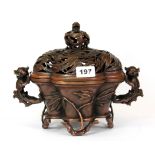 An impressive large Chinese cast bronze censer with bamboo and dragon decoration, H. 23cm, W. 28cm.