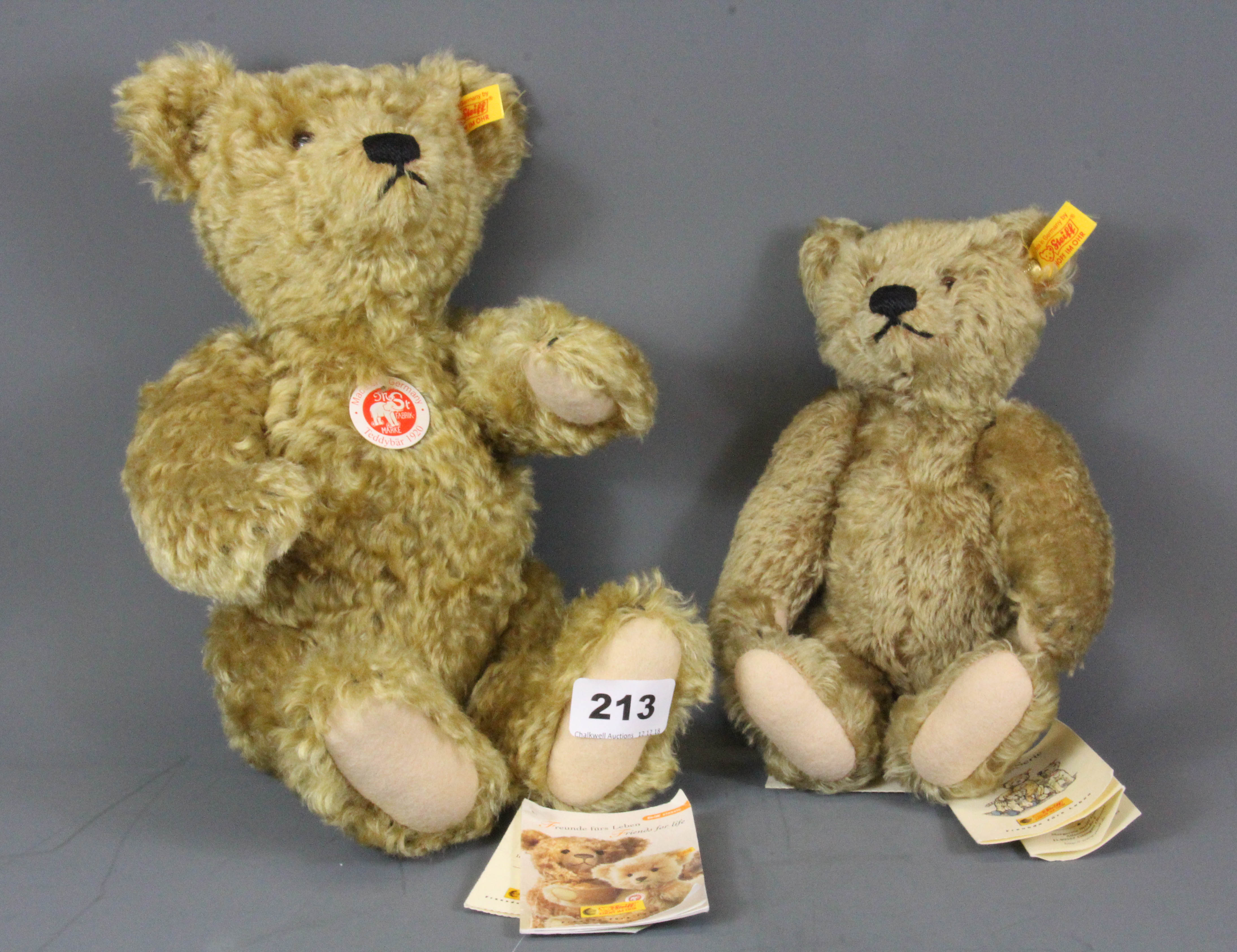 Two Steiff teddy bears.