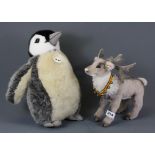 A Steiff penguin, H. 37cm, together with a Steiff reindeer.