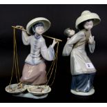 Two Lladro porcelain figures of Oriental girls, H. 25cm.