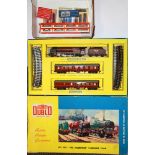 A Hornby 00 boxed Caledonian passenger train and other items.