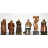 A group of six Black Forest carved wooden figures, tallest 16cm.