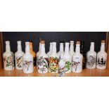 A collection of Portmeirion ceramic bottles.