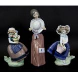 Three Lladro porcelain figures of girls with flowers, tallest 26cm, (tallest figure with small