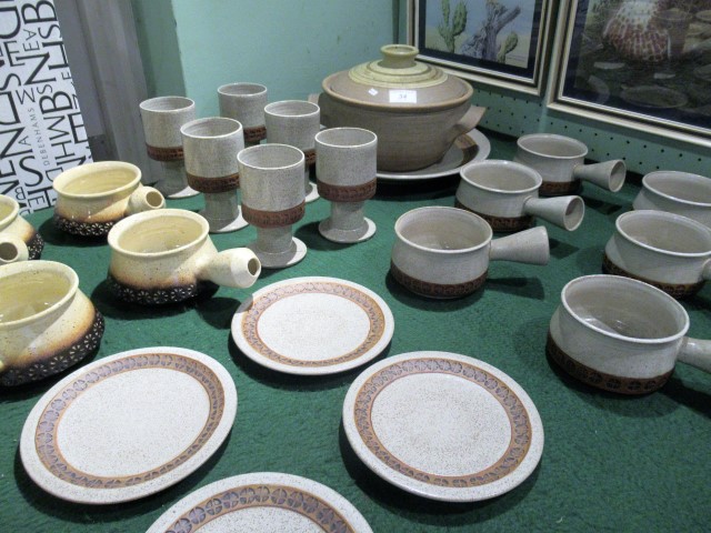 A collection of Iden Pottery of Sussex studio tablewares, to include: casserole, stemmed goblets,