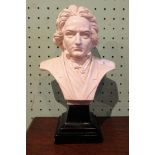 A composition bust of L. V. Beethoven, on an ebonised socle.