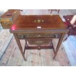 An Edwardian marquetry inlaid fold-over games compendium table,